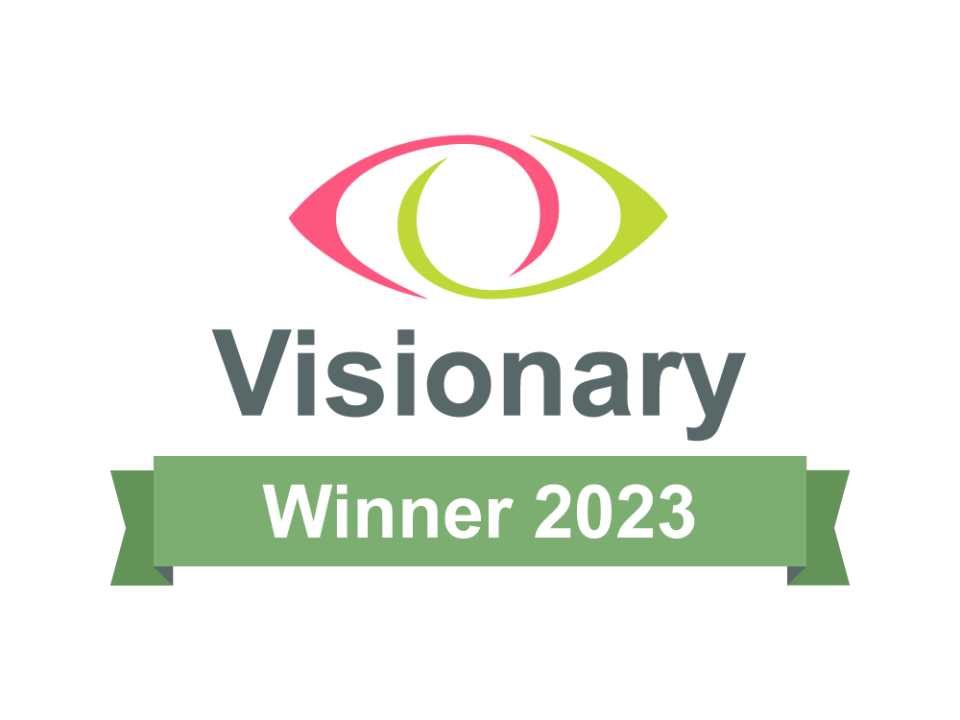 The pink and green Visionary logo is in the centre of the image. The text Winner 2023 is inside a green banner.