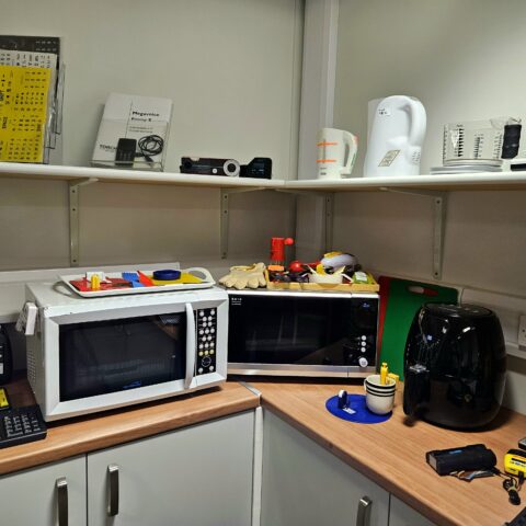 A close up of Talking Microwaves and kitchen equipment on display at MySight York's equipment centre.